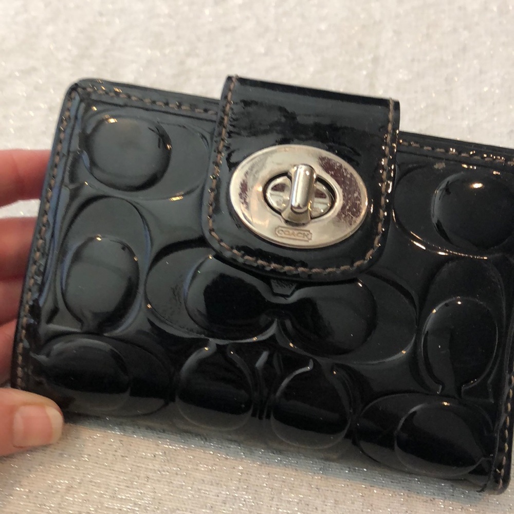 Black coach patent wallet.